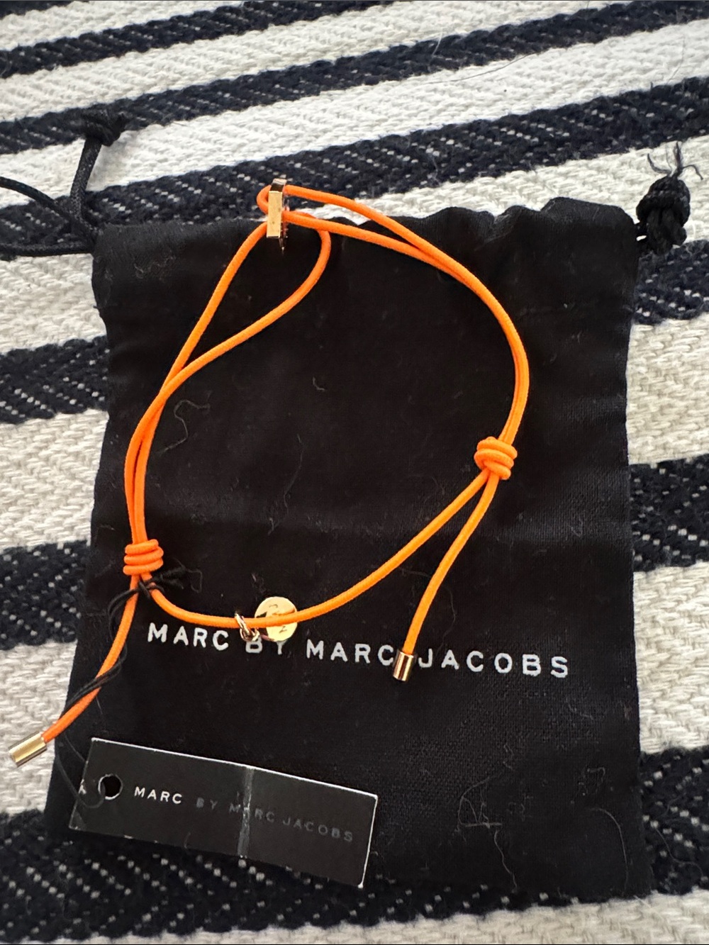 Marc by Marc Jacobs Bright Orange Adjustable Cord Bracelet with Gold Hardware